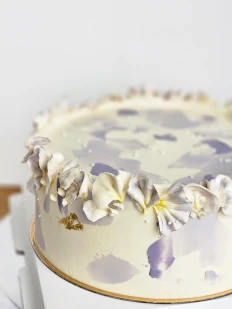 Lilac painted buttercream cake detail
